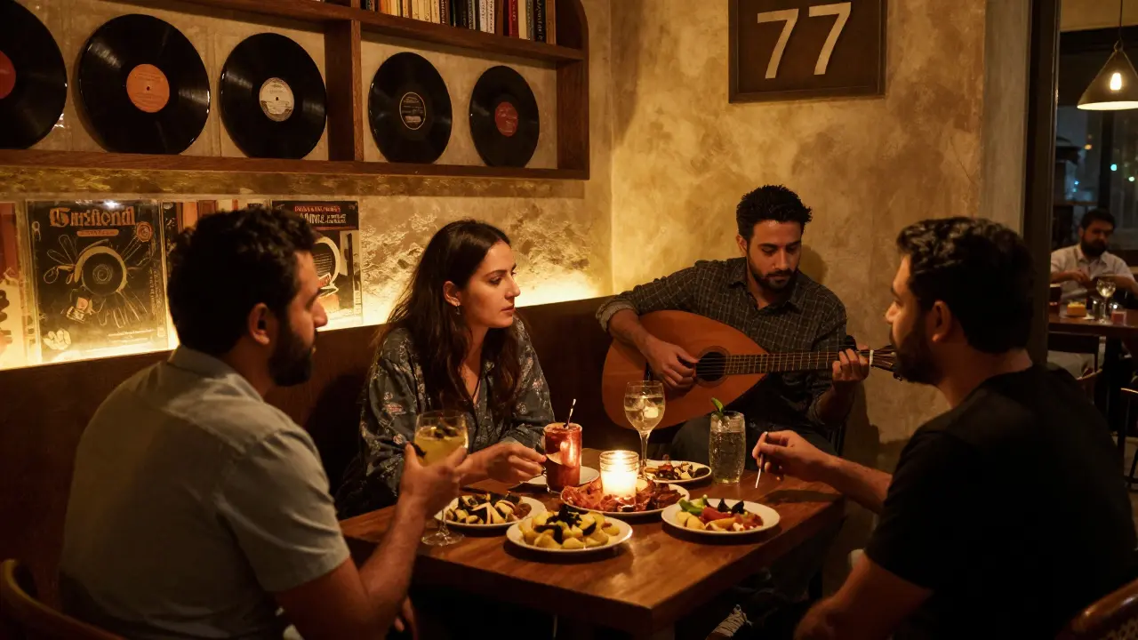Café 77's intimate lounge with dim lighting, vinyl records, and patrons enjoying Middle Eastern tapas and cocktails.